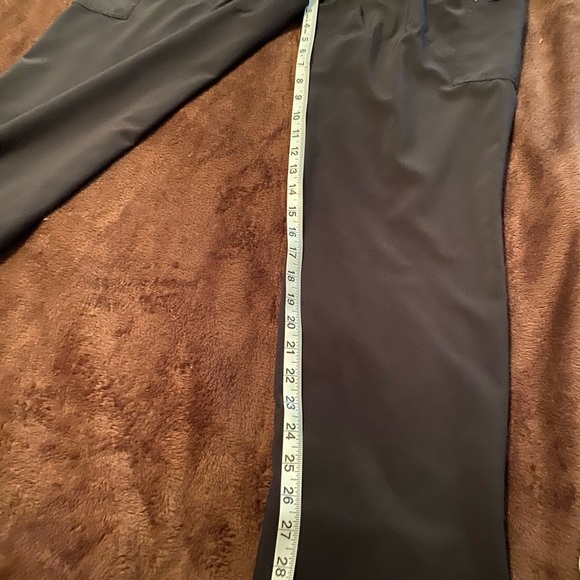 Black scrubs with teal accent. Small ankle split lots of pockets. - Picture 5 of 6